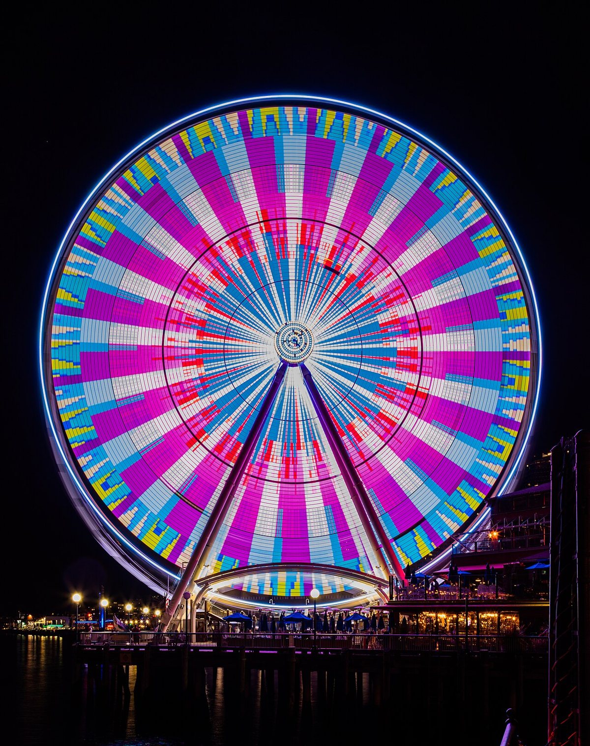 the illuminated Ferris wheel over Elliott Bay